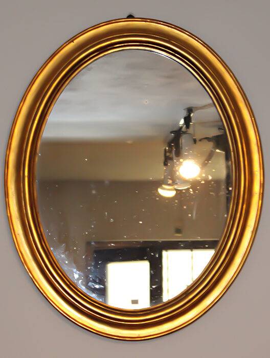 Specchiera ovale dorata 1800